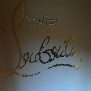 Christian Louboutin water snakeskin pumps